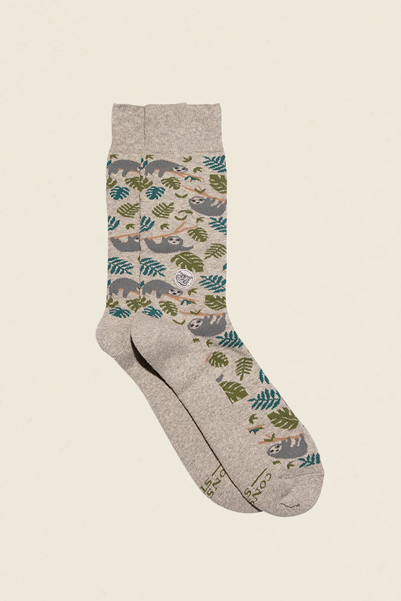 beige socks with sloths and leaves