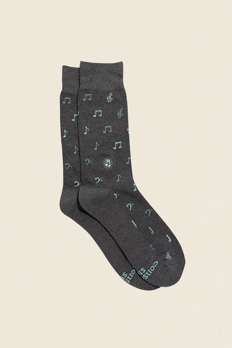 grey socks with blue music notes