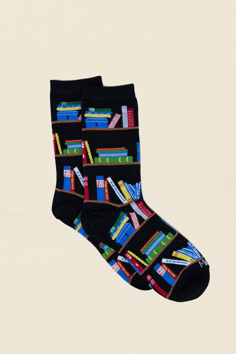 navy socks with books on bookshelves kin ship goods 