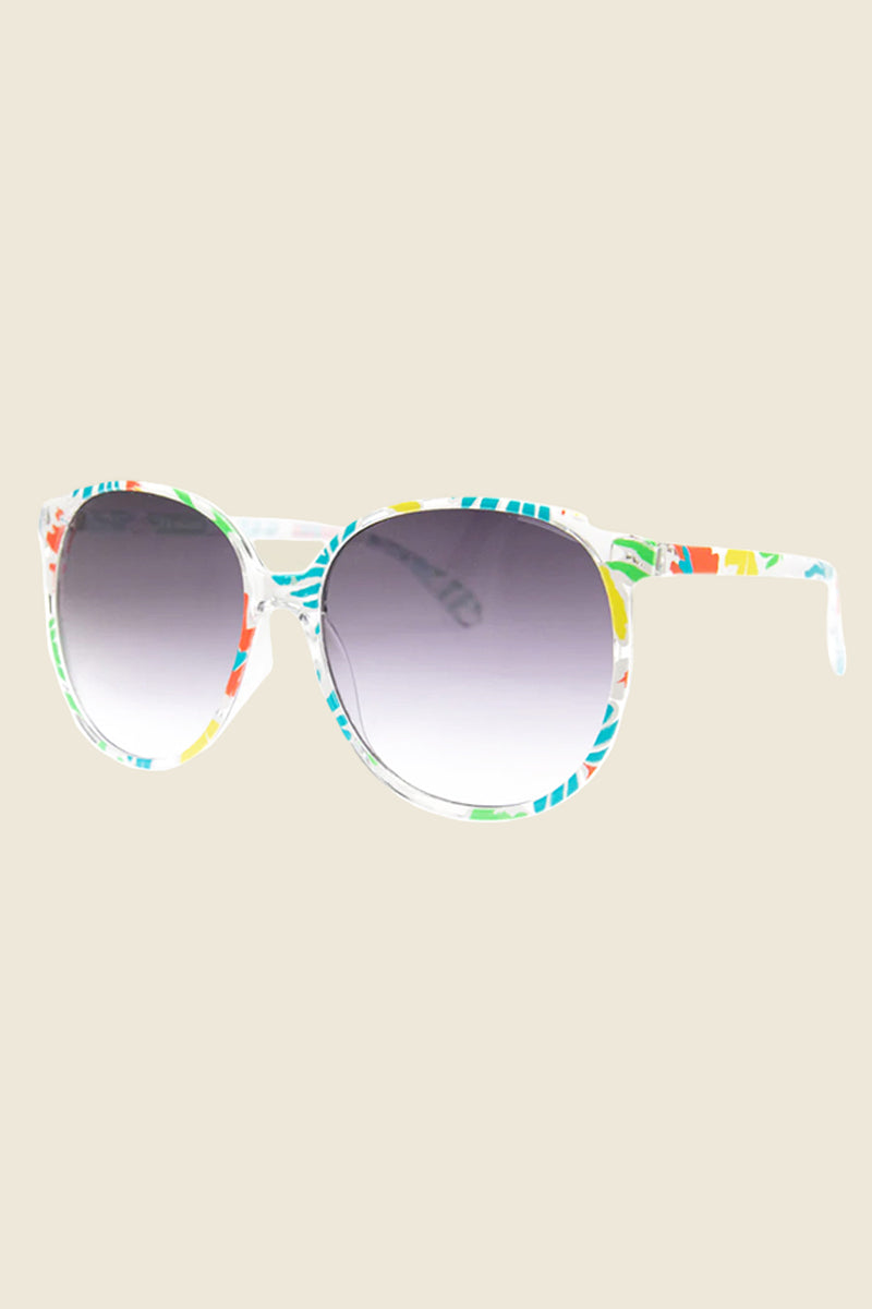 Kin Ship Goods Calypso sunglasses with multicolor tropical frames and round UV-protective lenses.

