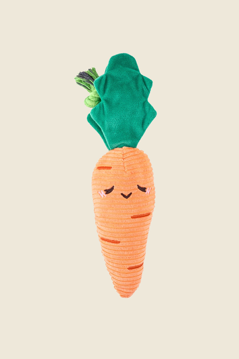 Kin Ship Goods plush carrot dog toy with green leafy top and ribbed orange texture for dogs.
