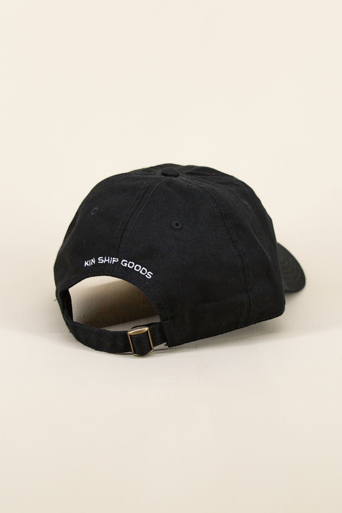 cozy time hat back kin ship goods black