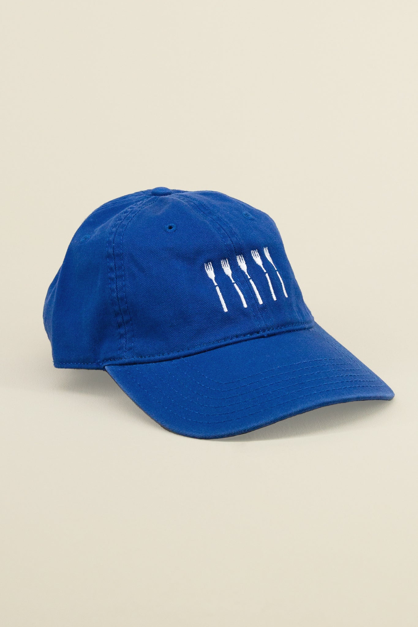 Kin Ship Goods x Doughboys royal blue dad hat with embroidered white forks lined up on the front panel.