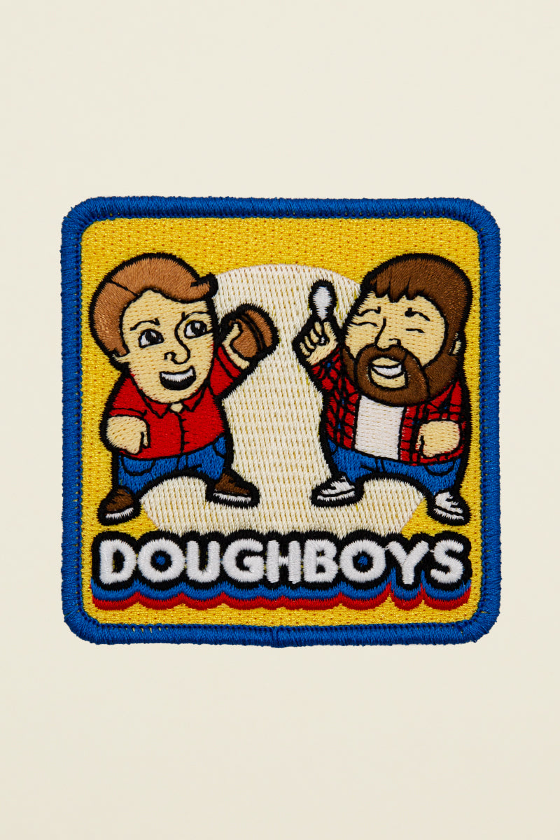 Doughboys embroidered patch from Kin Ship Goods – official collab featuring Nick and Mitch artwork. Perfect for jackets, bags, and podcast fans.