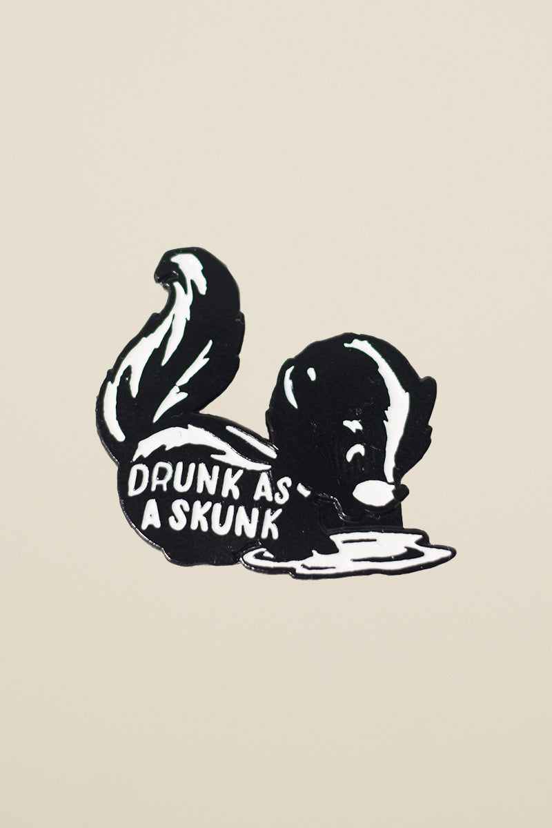 drunk as a skunk enamel pin