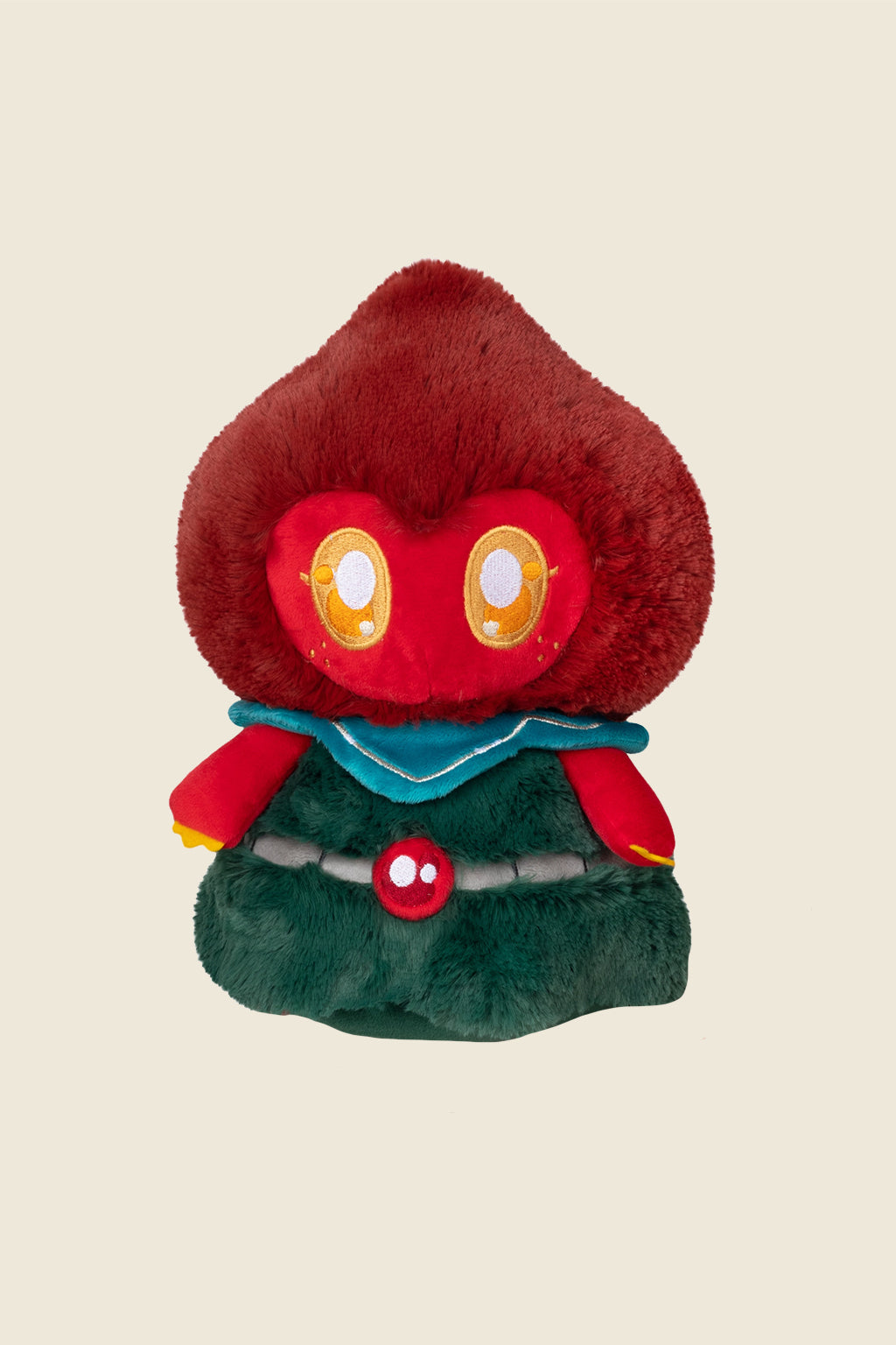 Flatwoods Monster plush toy with red face, big yellow eyes, and green cloak from Kin Ship Goods