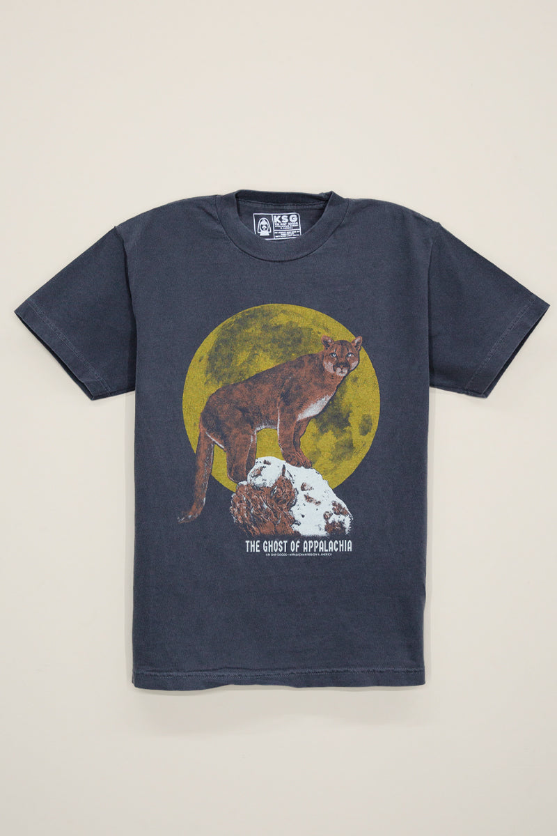 Kin Ship Goods black tee with illustrated mountain lion in front of golden moon and ‘The Ghost of Appalachia’ text below.