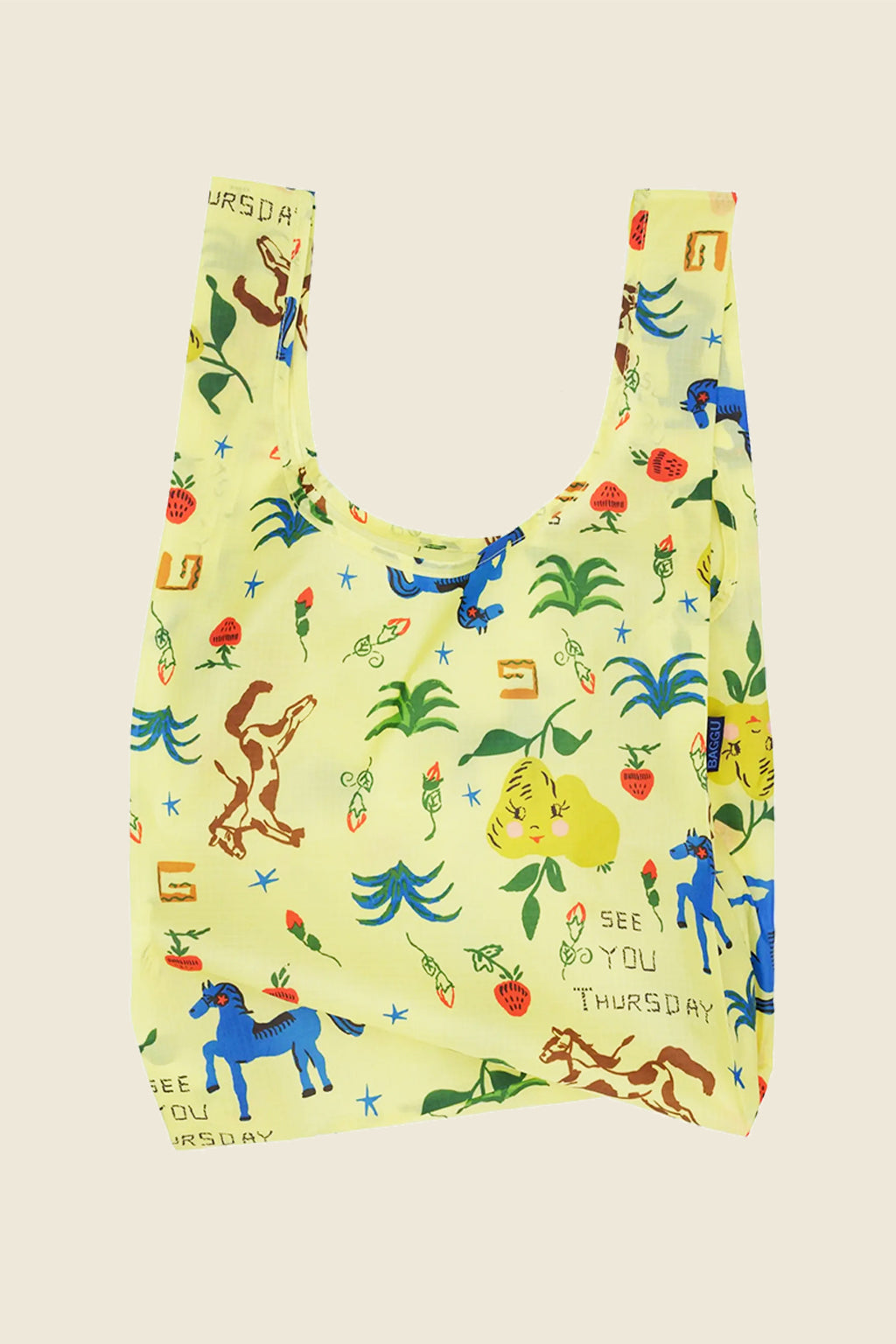 Painted Prairie Baggu with horses and fruit pattern on yellow background from Kin Ship Goods