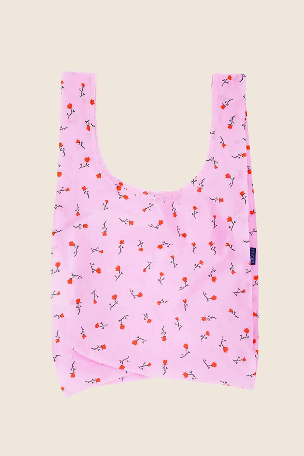 Kin Ship Goods Baggu tote with red wildflowers on pink background, reusable and eco-friendly.