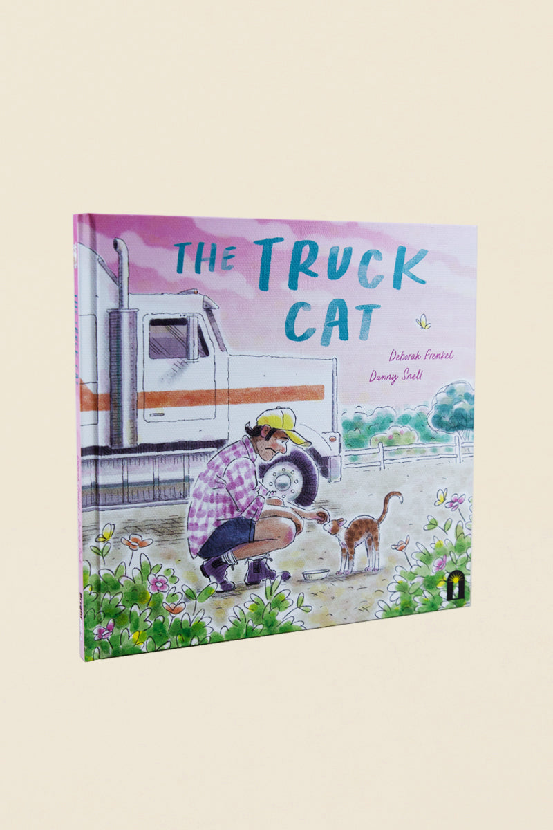 The Little Cat That Trucked book cover featuring a small cat driving a big red truck, sweet story about courage and independence