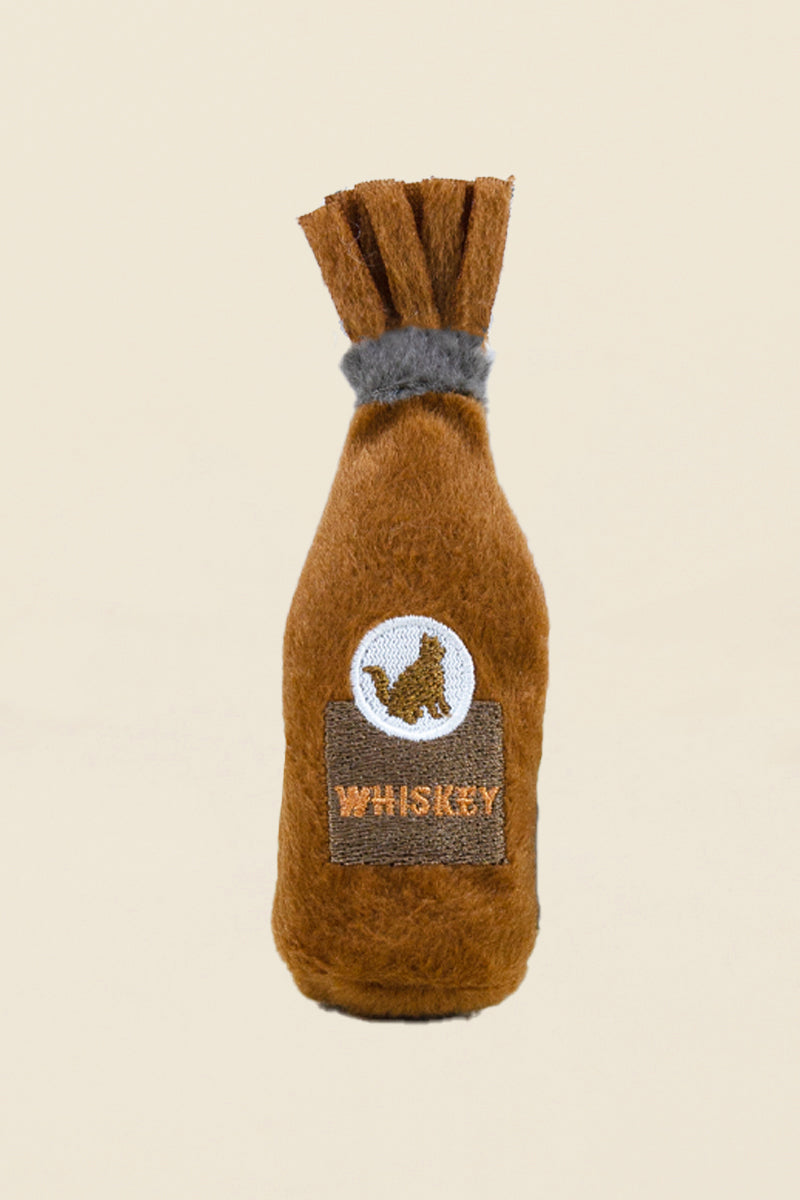 Kin Ship Goods whiskey bottle cat toy filled with organic catnip—funny plush toy for cats who like to party.