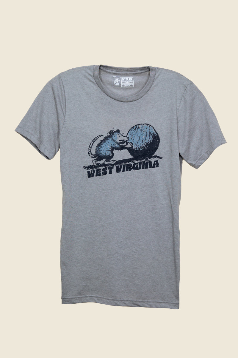 Kin Ship Goods tee with opossum pushing a boulder and “West Virginia” text, screen printed by hand on heather gray shirt.