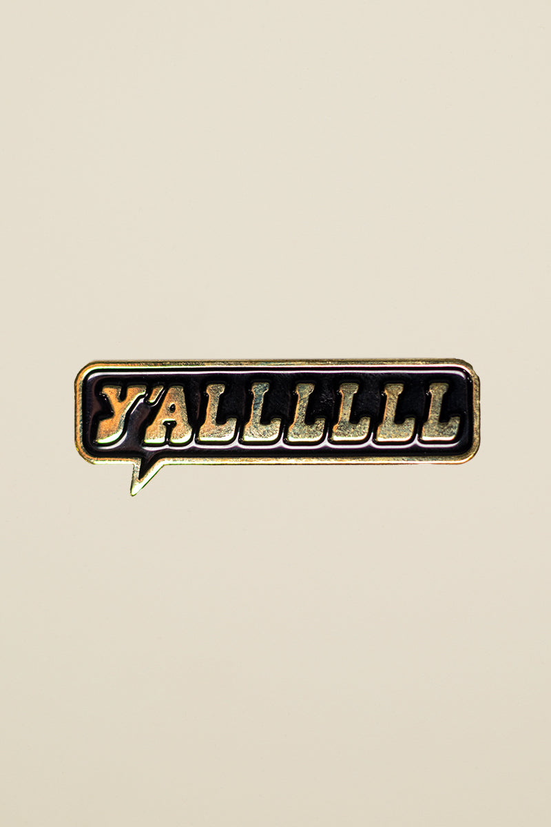 Y'ALLLLLL enamel pin from Kin Ship Goods – official Stay F. Homekins podcast merch featuring Paul F. Tompkins' signature catchphrase. Perfect for fans.