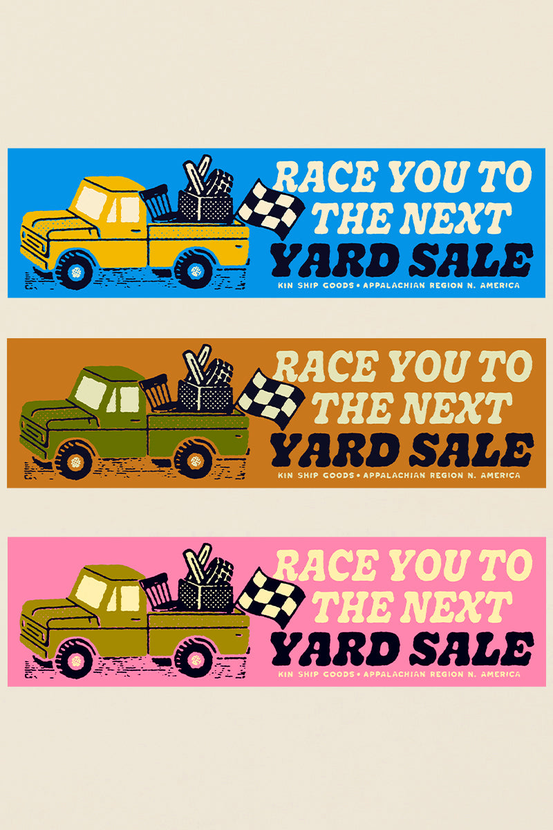 Kin Ship Goods bumper sticker featuring a retro pickup truck loaded with yard sale finds and a checkered flag, with the text “Race You to the Next Yard Sale.